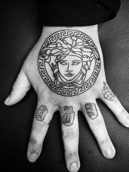 versace pattern tattoo|medusa tattoo meaning for female.